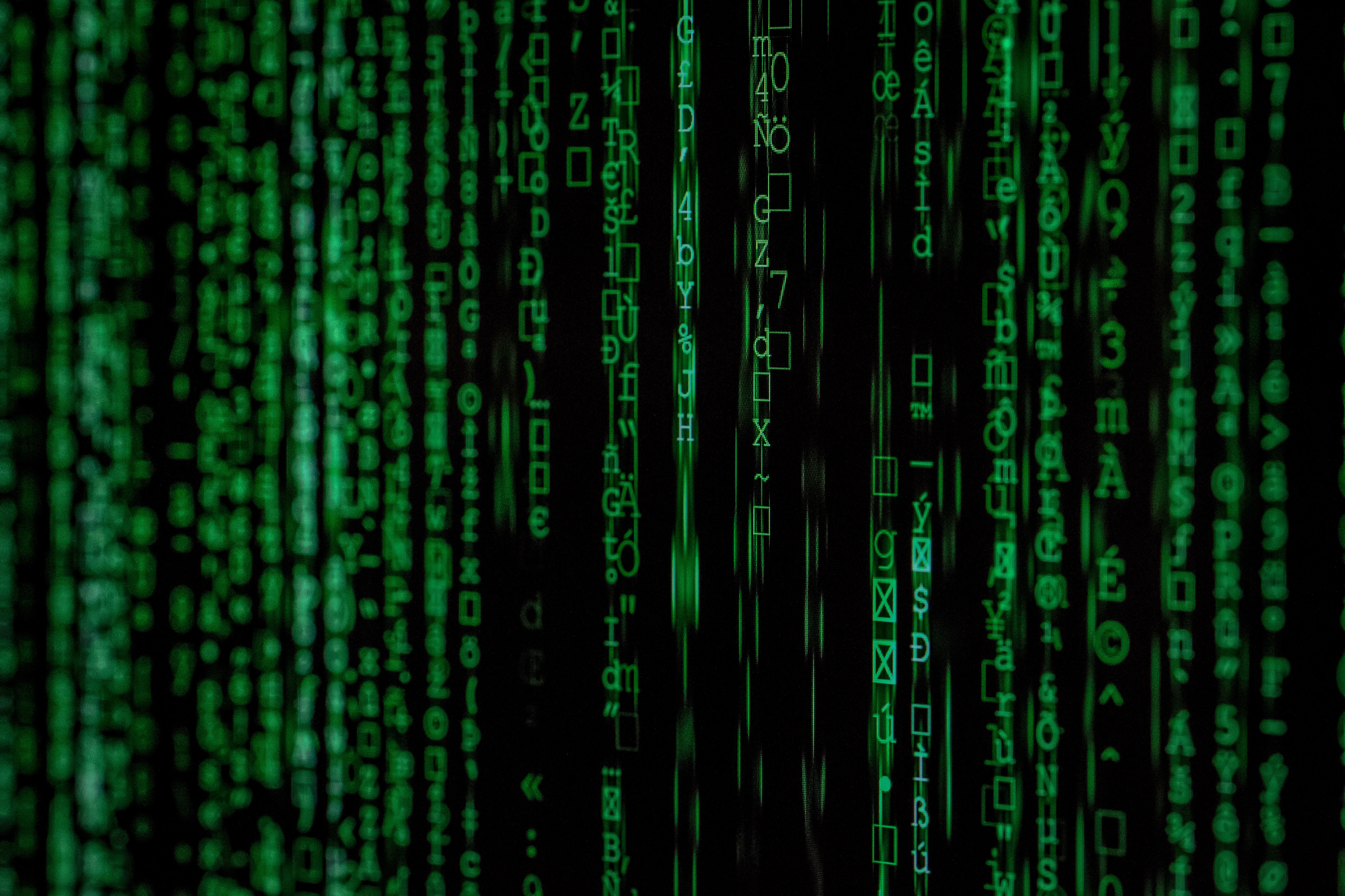 Fraud Detection image - green characters in vertical lines